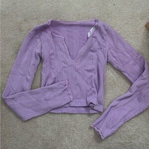 Urban Outfitters out from under purple top